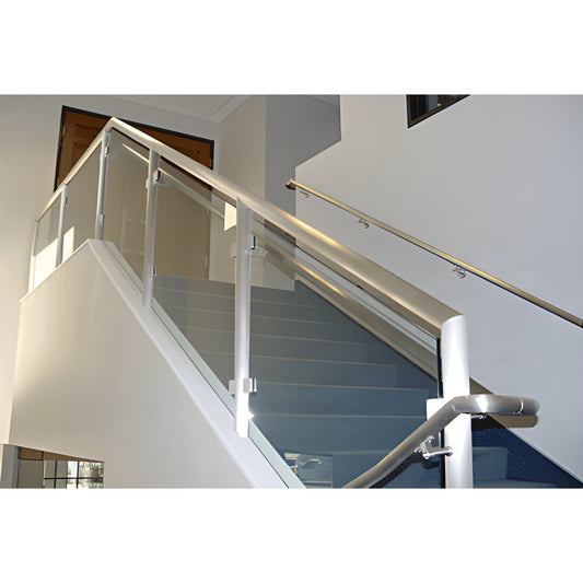 PR1540M mill-finish aluminum welded stair railing with glass panels and tubular posts.