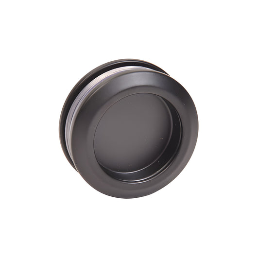 TFN78MBL matte-black concealed frameless sliding shower system with top rail, glass door in modern green-tiled bathroom.