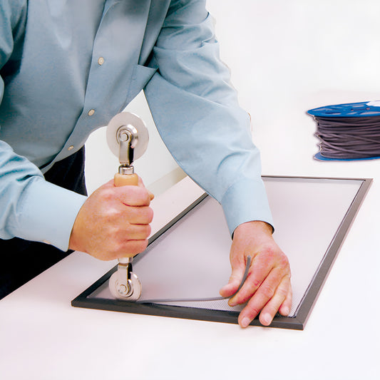 Black hollow-core vinyl serrated screen spline on blue spool, 0.22 in diameter, SKU SSBL220B