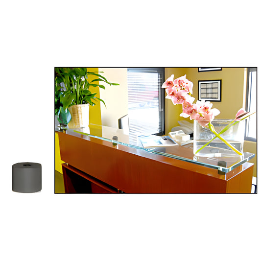 Matte black 3/4" standoff (SKU S0B3434MBL) with example glass-panel mount on a reception desk.