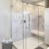 HYDK60BN 60-inch Hydroslide brushed-nickel top-mounted sliding frameless glass shower door with bench and marble tile