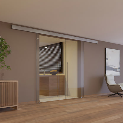 CRL50S2 satin anodized top-track for synchronized bi-parting tempered glass doors with one sliding glass panel.