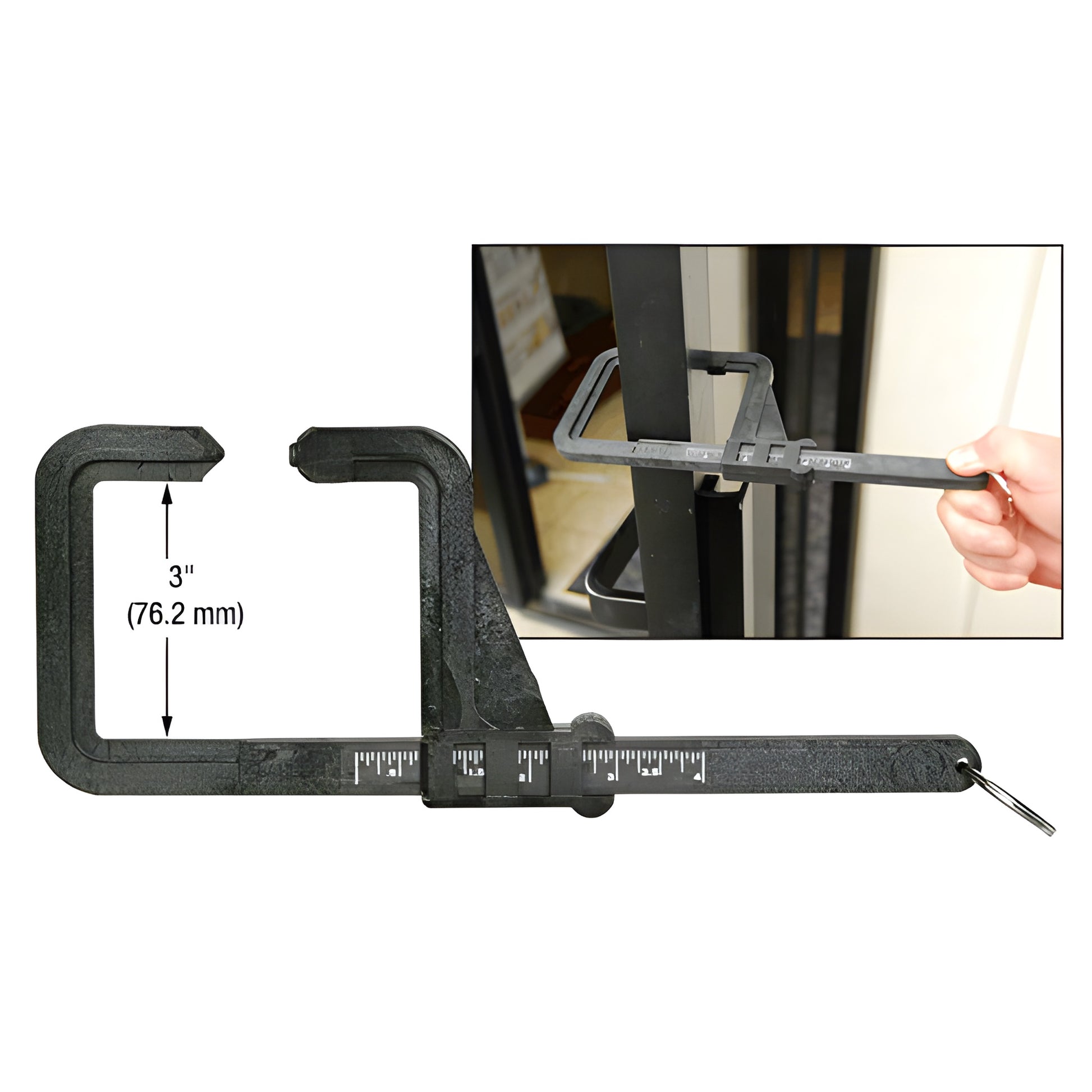 Black plastic CRL insulating glass caliper with dual-sided inch scale, 3" jaw reach and keyring loop, shown measuring a windo