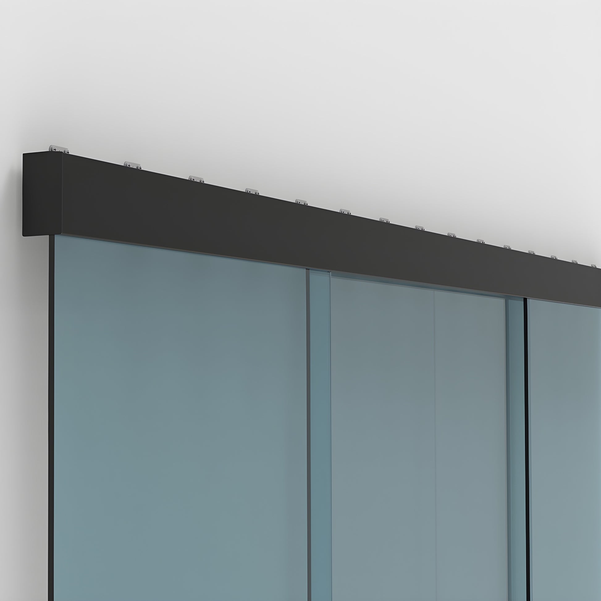 Matte black wall-mounted top track with two synchronized sliding tempered glass panels.
