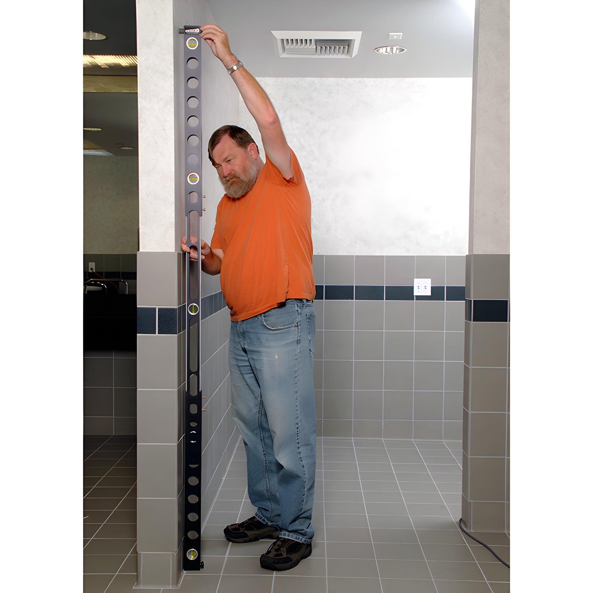 PPL98 expanding plumb level, black vertical tool with center spirit vial, sliding aluminum rails and knurled lock screws